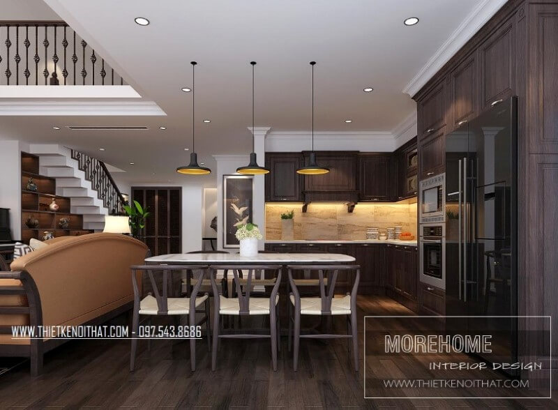Liền kề là phòng khách sang trọng là không gian phòng ăn ấm cúng kết hợp phòng bếp giúp cơi nới không gian thêm rộng hơn, giúp cho cả gia đình luôn có cảm giác ấm áp quây quần bên nhau Thiết kế nội thất phòng ăn gỗ óc chó cao cấp sang trọng